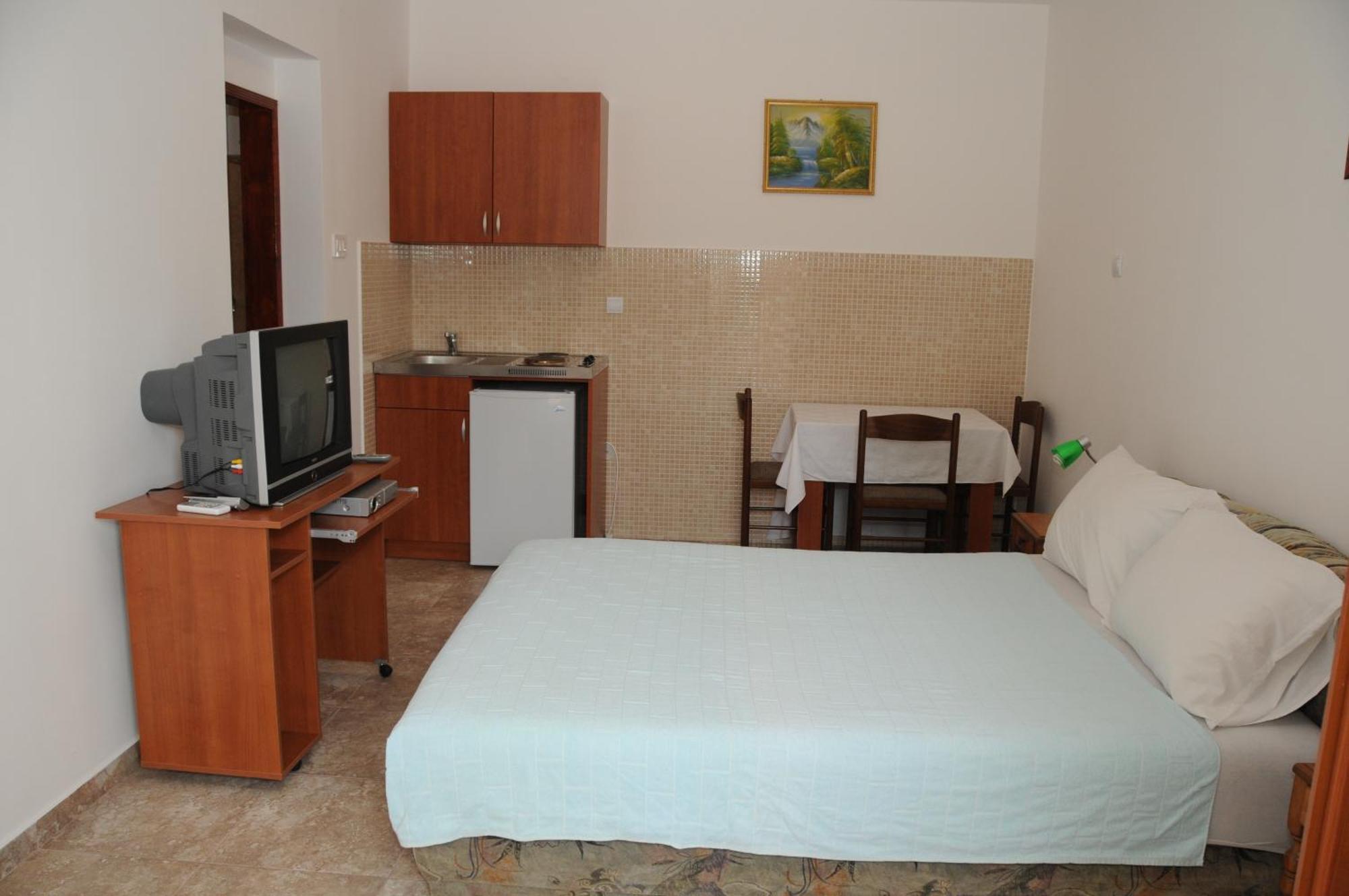 Apartments Dragisic Ilha Ilha Sveti Stefan Quarto foto